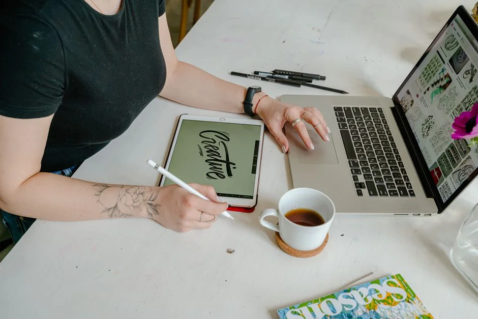 A portable computer displaying a website with a mix of abstract photos in favorites and a browser search engine marked by a magnifying glass symbol